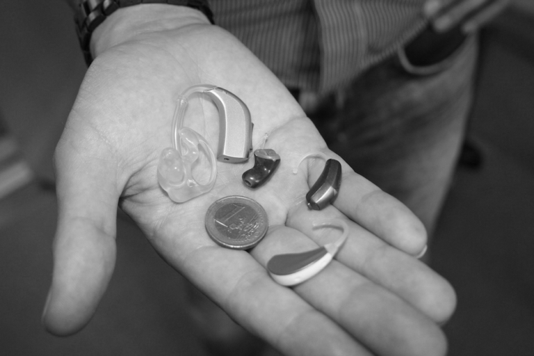 Hearing Aids in palm of hands