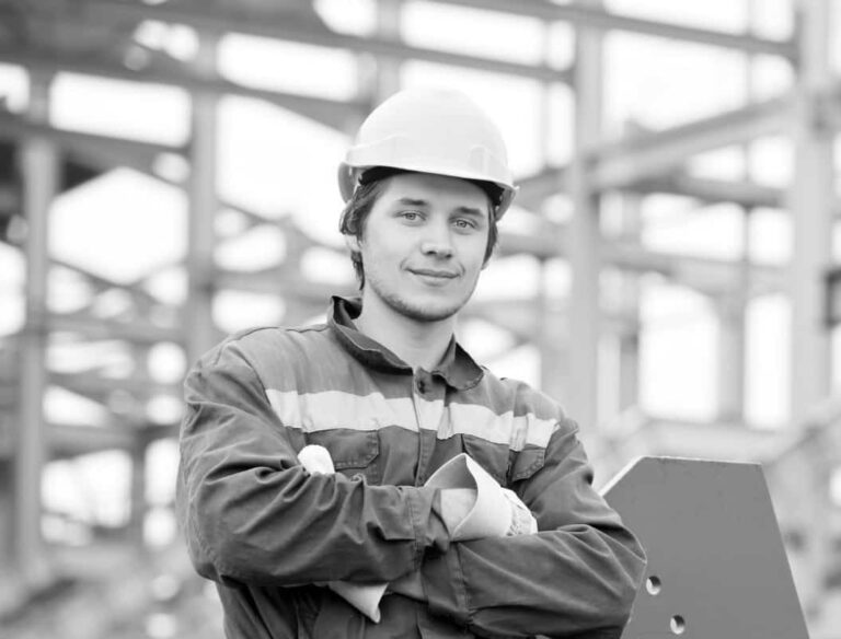 Builder/construction worker smiling at work
