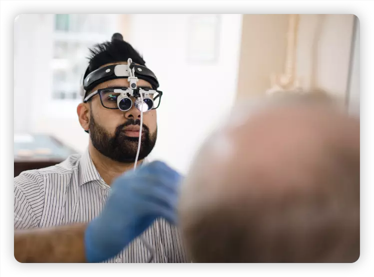 Audiologists during hearing test
