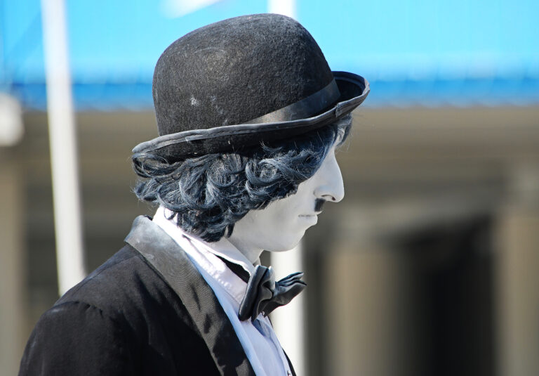 Genova - Italy - October 23, 2016: Mime dressed like Charlie Chaplin, Charlot, in the streets of Genova. Italy