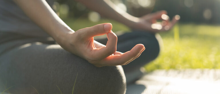 Woman Practicing Meditate On The Park. Asian Woman Doing Exercis