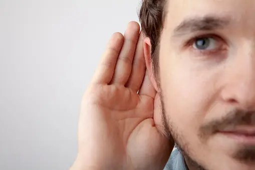 man trying to listen