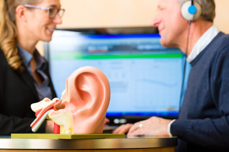 Hearing test Huddersfield - pensioner with a hearing problem make a hearing test