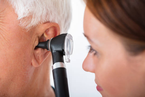 Ear infection treatment - checking ear