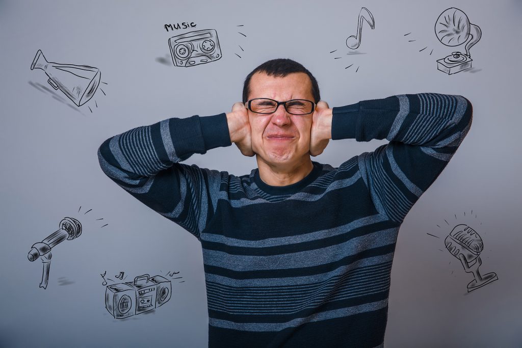 Private hearing aids - closes her ears loud music stress